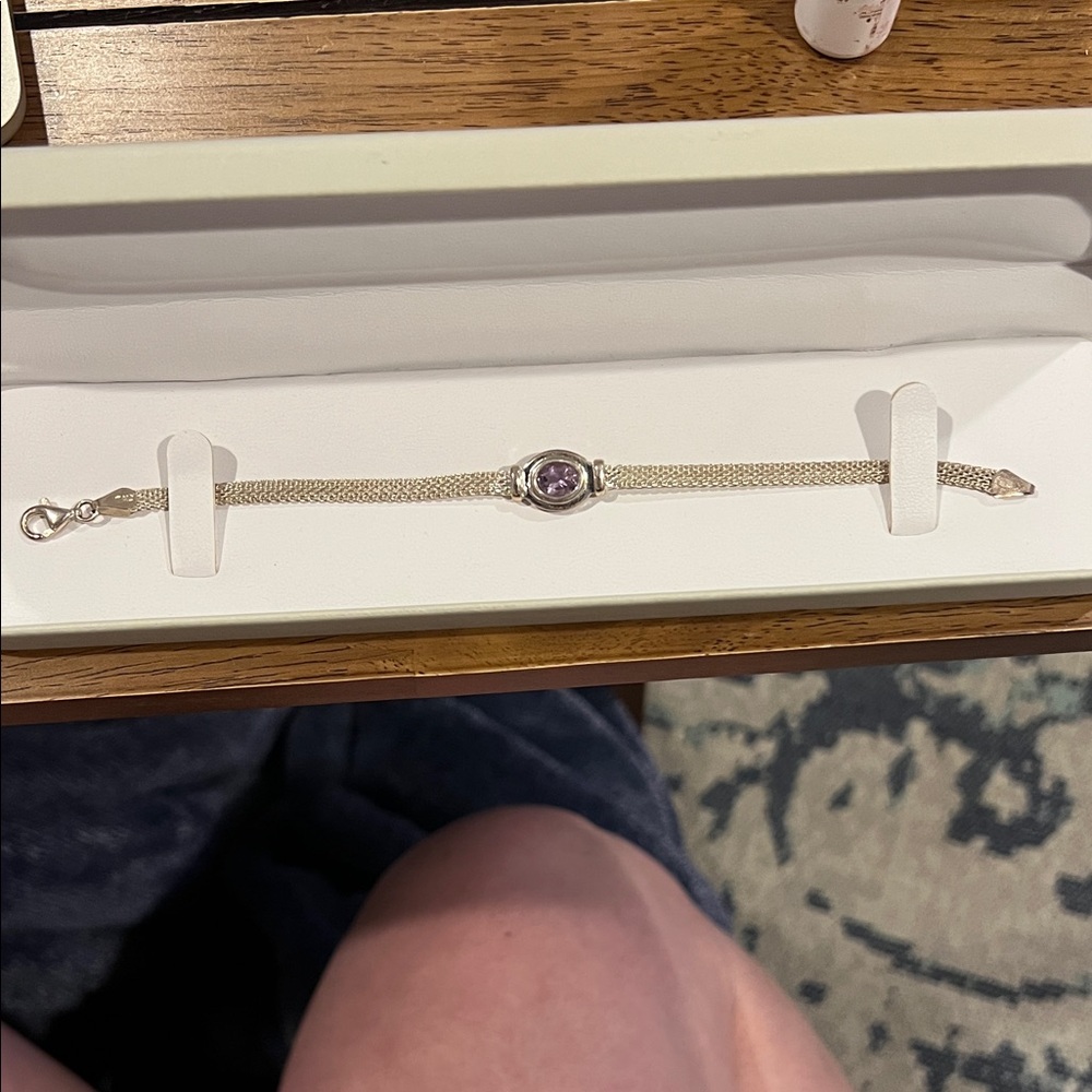 Elegant Silver Bracelet with Purple Gemstone
